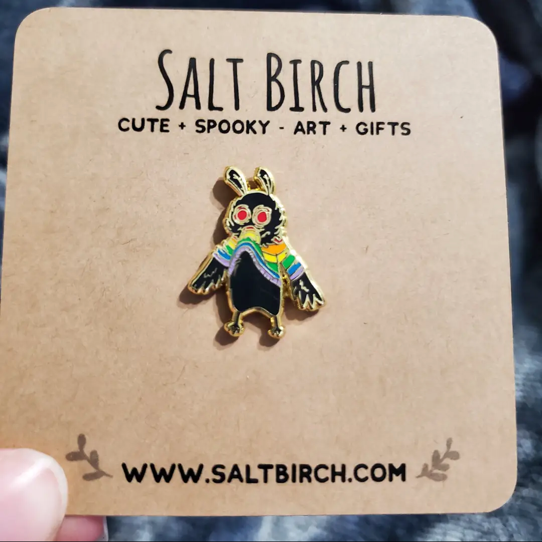 Salt Birch Hungry Little Mothman in a Rainbow Sweater Enamel Lapel Pin